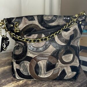 SOLD.    Coach Black and Brown Tote with Gold Accents